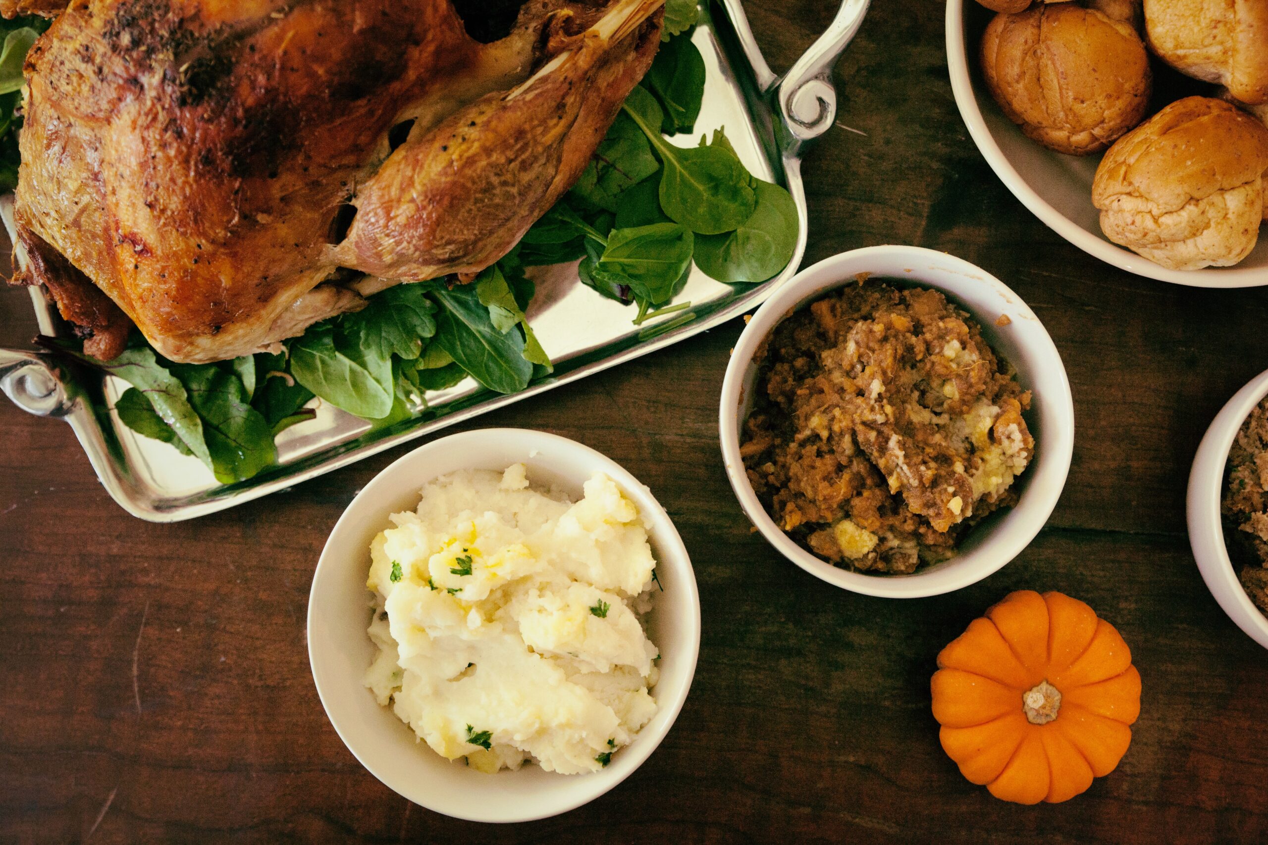 turkey, mashed potatoes, dressing, pumpkin